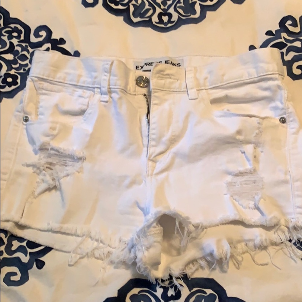 Express high rise distressed white shorts